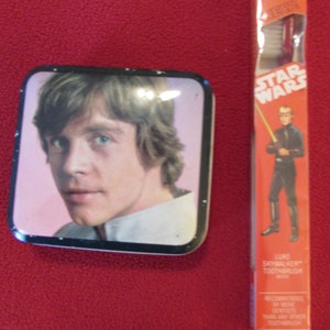 Star Wars - Luke Skywalker Oral-B Toothbrush (1983), Storage Tin from The Empire Strikes Back