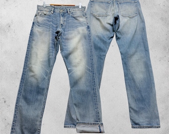 Vintage jeans met selvedge afwerking, maat W31x30, skinny fit, lichte wassing, rode streep, Japanse stijl.