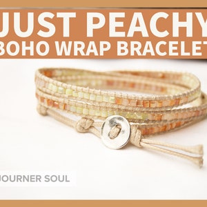 May include: A multi-strand wrap bracelet with peach, cream, and gold beads. The bracelet is tied with a knot and has a silver button closure. The bracelet is labeled "Just Peachy Boho Wrap Bracelet" and "Sojourner Soul".