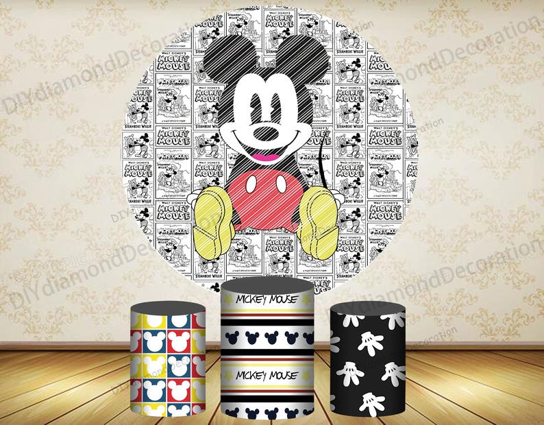 May include: A large circular backdrop featuring Mickey Mouse with a vintage comic strip background. Three cylindrical stands are in front, each with a different Mickey Mouse-themed design. One stand has a yellow, red, blue, and white pattern.