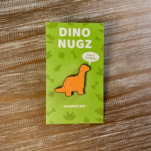 Dino Nug Enamel Pin