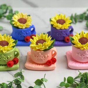 Handmade cup with a yellow sunflower soap and raspberries with peony fragrance oil in the plastic clear gift box, budget gift