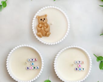 Handmade beaded Secret Message It's a Boy or It's a Girl Soy Candle with the cotton wick in a ceramic cup in a gift box for gender reveal