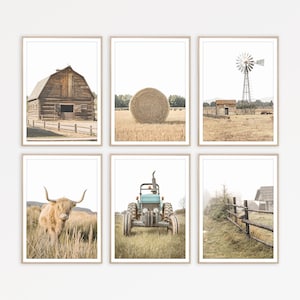 May include: Set of six framed prints featuring rustic farm scenes. The prints include a wooden barn, a hay bale, a windmill, a tractor, a Highland cow, and a wooden fence.