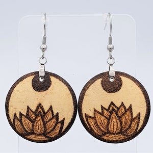 Earrings with pyroenure of a flowering lotus flower