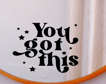 May include: A black and white motivational quote sticker that reads "You got this" with stars around the text. The sticker is on a white background.