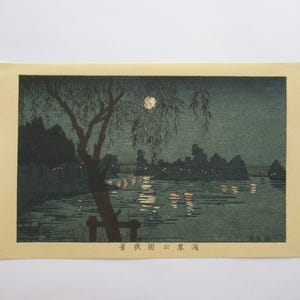 Reproductie houtsnede/Yasuji: avondzicht op Asakusa Park, uit de serie, echte foto's van beroemde plaatsen in Tokio