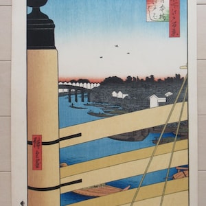 Reproductie houtsnede/Hiroshige: Nihonbashi-brug en Edobashi-brug, uit de serie Honderd beroemde gezichten op Edo