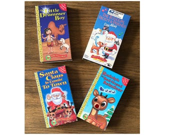 Lot of 4 Christmas VHS Tapes Rudolph, Santa Clause, Drummer Boy, Sing A Long Son