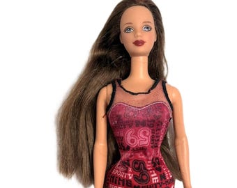Barbie Teresa Doll Dressed in Red and Black Dress Dated 1991