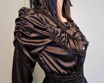 Shiny black spandex puffed shoulder top size S