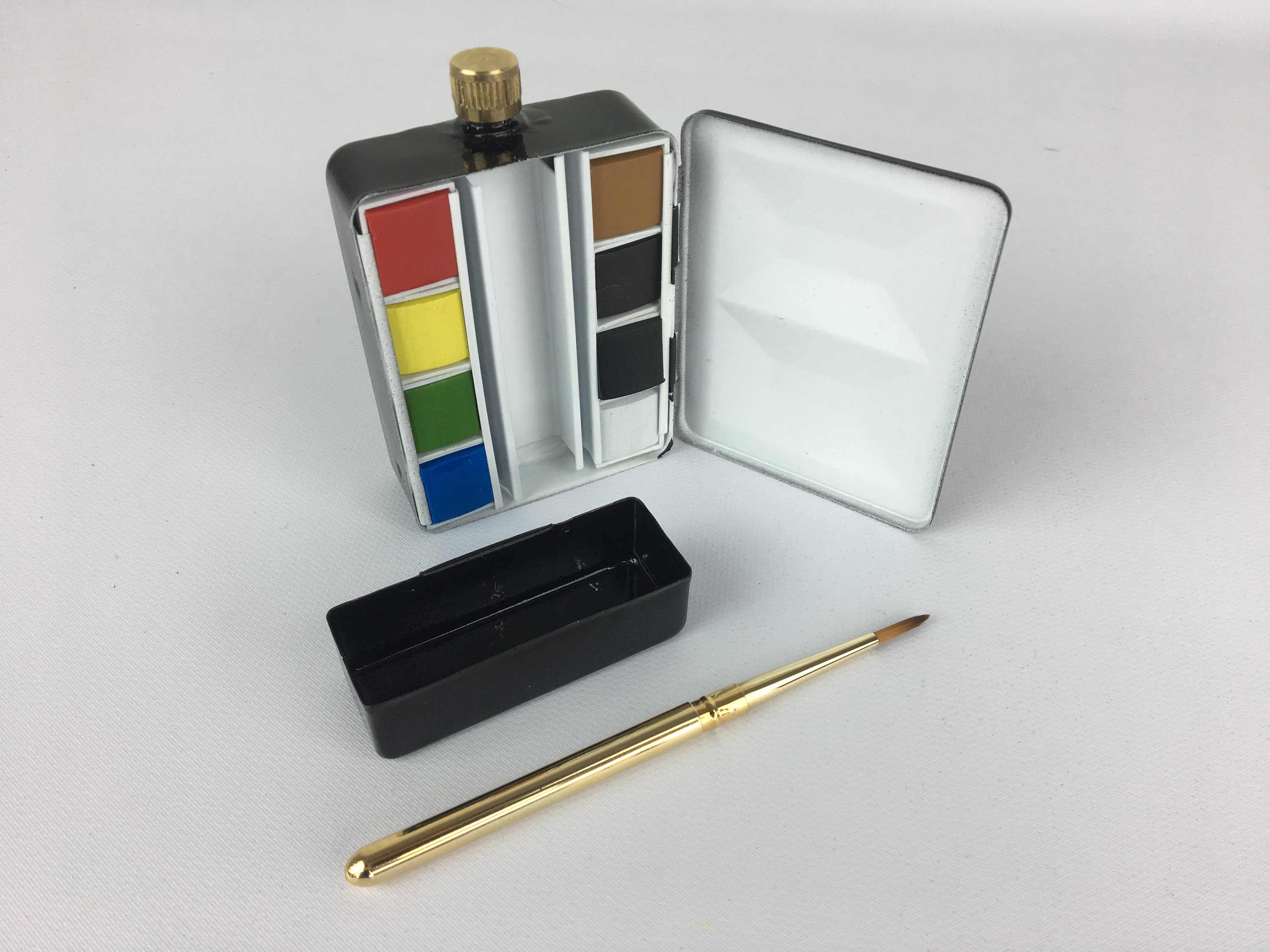 Professional Watercolor Paint Set-24 Vibrant Pans in Pocket Box with Metal  Ring and Watercolor Brush, Portable Artist Travel Tin & Mixing Palette