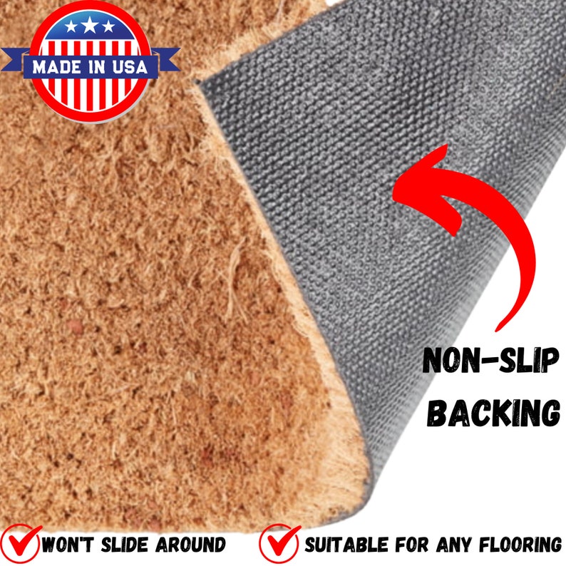 May include: A rectangular doormat with a rough, brown surface and a gray, non-slip backing. The doormat has the text "MADE IN USA" and "NON-SLIP BACKING". The text "WON'T SLIDE AROUND" and "SUITABLE FOR ANY FLOORING" are also visible.