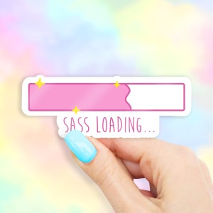 May include: Pink and white sticker with a progress bar that says "SASS LOADING..." with yellow stars on the progress bar.