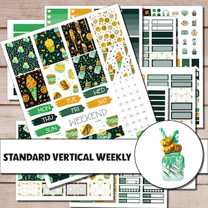 May include: A set of planner stickers with a dessert theme. The stickers feature ice cream cones, cupcakes, and other treats in shades of green, brown, and yellow. The set includes weekly and daily stickers, as well as decorative elements. The text "STANDARD VERTICAL WEEKLY" is displayed.