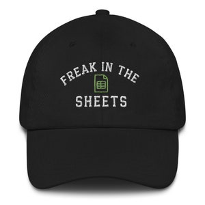 May include: Black baseball cap with white embroidered text that reads "Freak in the Sheets" with a green spreadsheet icon.