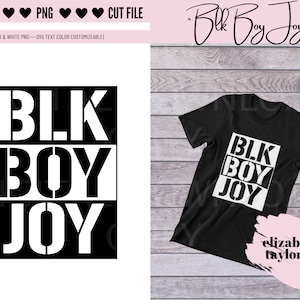 May include: Black and white graphic design with the text "BLK BOY JOY" in a bold, blocky font. The design is shown on a black t-shirt.