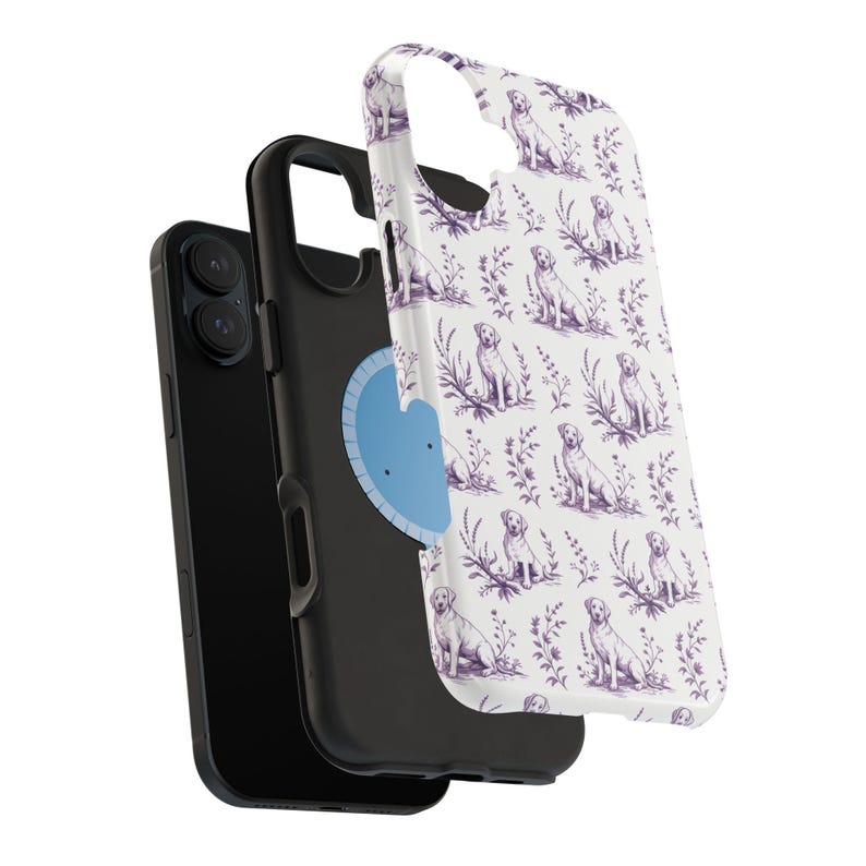 May include: A black smartphone with a protective case featuring a white background and a repeating pattern of purple Labrador Retrievers and floral elements. The case is detached, showing the phone's back.