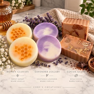 May include: A collection of handmade soaps including two round honey-scented bars with honeycomb patterns, two round lavender-scented bars with purple swirls, and two rectangular cocoa-scented bars with gold leaf accents, labeled Coby's Creations.