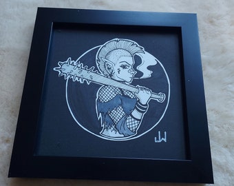May include: Black framed artwork featuring a detailed black and white illustration of a character with a mohawk, holding a spiked bat. The character is smoking, with a detailed face and tattoos. The artwork is set against a black background.