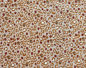 Beige Animal Print Four Way Stretch Jersey Fabric
