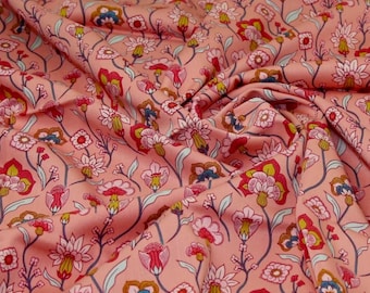 Tejido elástico de viscosa con estampado floral rosa
