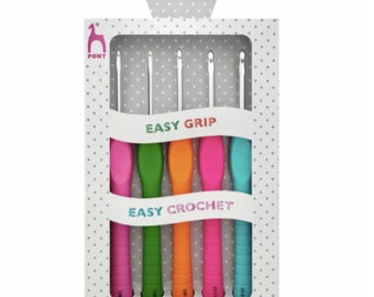 May include: A set of five colorful crochet hooks with easy grip handles. The hooks are labeled "Easy Grip" and "Easy Crochet". The packaging is white with black polka dots and the Pony logo.