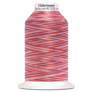 May include: A spool of Gütermann Bulky-Lock 80 thread in a blend of red, white, and purple hues. The thread is tightly wound on a white plastic spool, with the brand name and thread type printed on the top.