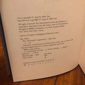 The Ink-keepers Apprentice by Allen Say, Houghton Mifflin Company, 1994, first printing of this edition, signed with a doodle image 9