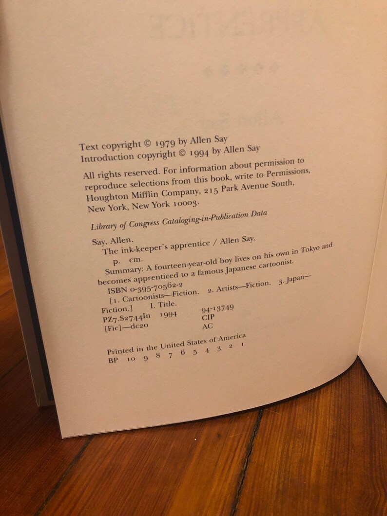The Ink-keepers Apprentice by Allen Say, Houghton Mifflin Company, 1994, first printing of this edition, signed with a doodle image 9
