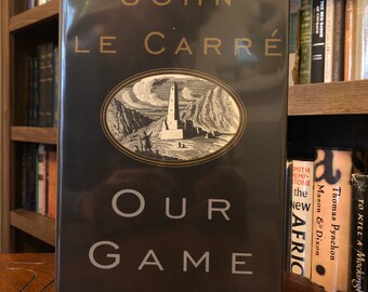 Nuestro juego por John Le Carre Primera edición, Primera impresión, Alfred A Knopf, 1995