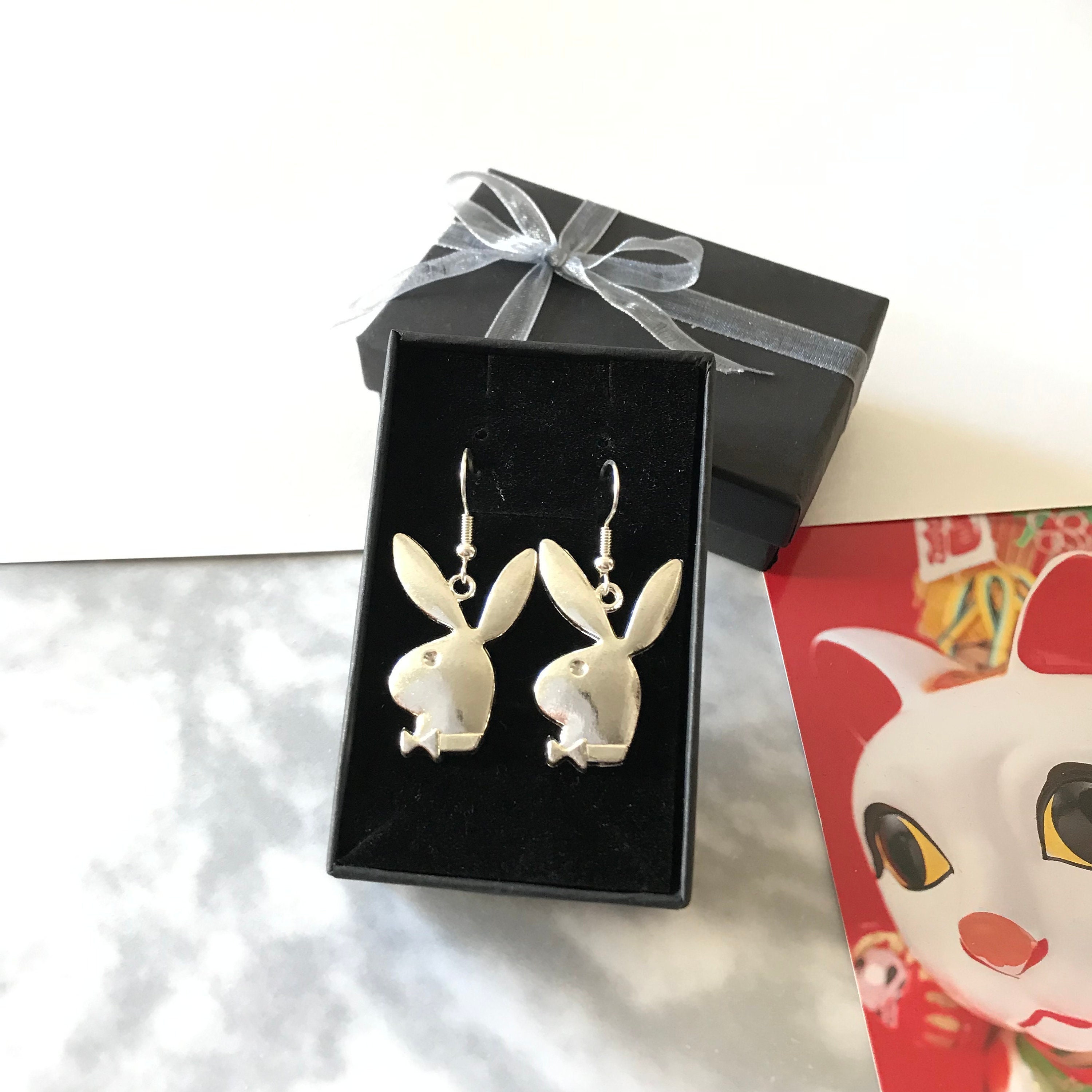 Playboy earrings deals dangle