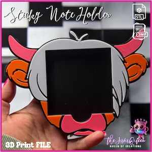 May include: A colorful sticky note holder shaped like a cartoon Highland cow. The holder features a black square for notes, with pink, orange, and white accents. The text "Sticky Note Holder" is visible. The design is a 3D print file.