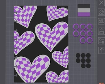 May include: A notebook cover featuring a black background with a repeating pattern of purple and white checkered hearts. To the right, there is a small rectangular flag with black, gray, and purple horizontal stripes, along with purple and black rings.