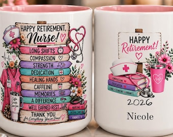 May include: Two white ceramic mugs with pink handles and interiors. The left mug features a sign reading Happy Retirement Nurse with stacked text including Long Shifts, Compassion, and Healing Hands. The right mug displays Happy Retirement 2026 Nicole.