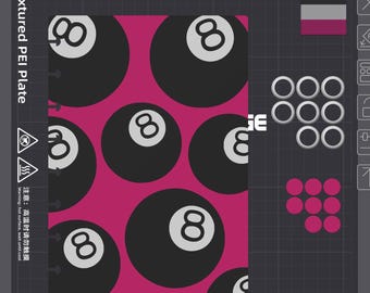 May include: A rectangular notebook cover featuring a repeating pattern of black eight-balls on a vibrant magenta background. The design includes the text Eightball Notebook, a color swatch, and various circular icons on a dark gray grid interface.
