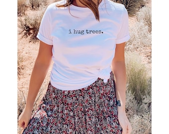 Minimalist T-Shirt "i hug trees." Tree Hugger Graphic Tee Inspirational Phrase Spiritual Self Care Mental Health Forest Therapy Earth Day