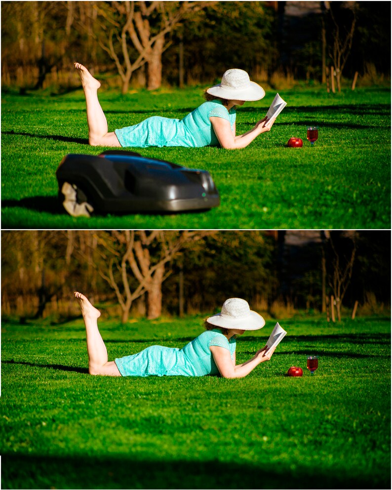 May include: A woman wearing a white sun hat lies on a green lawn reading a book. A glass of red wine and a red apple are on the grass beside her.