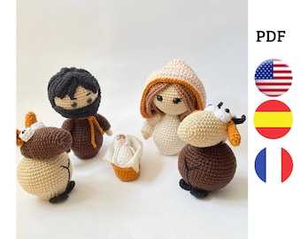 May include: Crocheted nativity scene with a brown and beige cow, a brown and beige sheep, a brown and beige Joseph, a white and beige Mary, and a white baby Jesus in a brown basket.