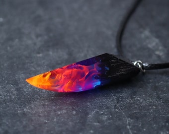 Pendentif bois et résine Aurore boréale phosphorescente