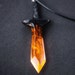 see more listings in the Weapon pendants section