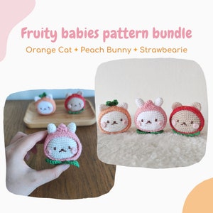 May include: A set of three crocheted amigurumi toys, each representing a different fruit. The toys are a peach bunny, an orange cat, and a strawberry bear. The toys are all wearing cute expressions and have green leaves on their heads.
