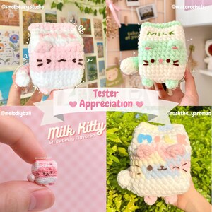 May include: Three crocheted milk carton kitty plushies in different colors. The first is pink and white, the second is green and white, and the third is rainbow colored. The plushies have cute cat faces and are holding milk cartons that say "Milk".