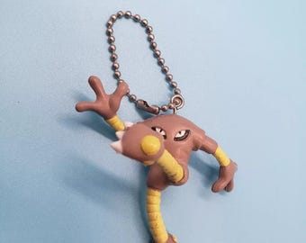 Llavero de Hitmonlee de Nintendo, figura del Centro Pokémon n.° 13