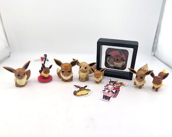 Eevee lot figures bundle Pokemon Center Tomy Bandai Tretta Token + Free Case