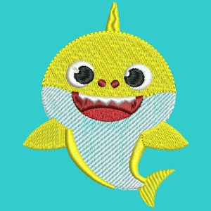 Peut inclure: Broderie de requin jaune avec un ventre blanc, des yeux noirs et une bouche rouge. Le requin a une expression joyeuse et se détache sur un fond turquoise. Ce motif convient aux articles pour bébés.