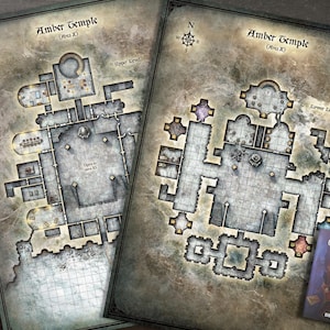 May include: Two detailed maps of the Amber Temple, with upper and lower level layouts, compass rose, and text. A small book titled "Curse of Strahd" is visible. The maps are printed on aged paper.