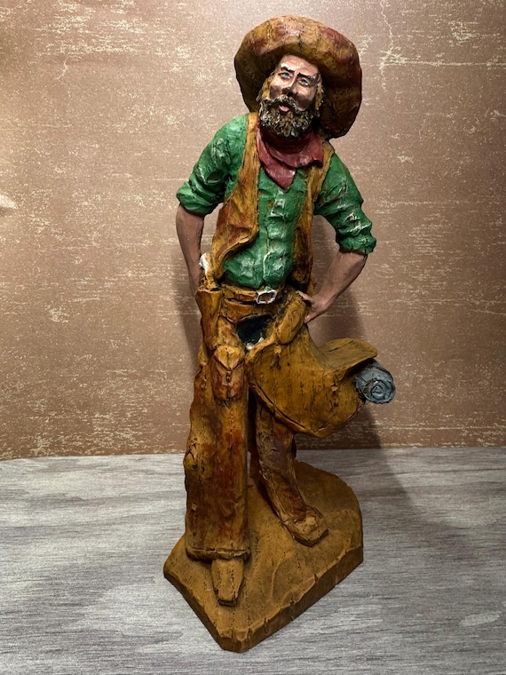 Fred Curtis Figurine-Cowboy with his Saddle