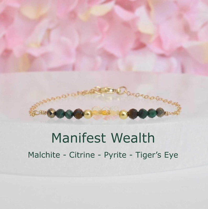 Goodluck bracelet 
 featuring citrine, gold filled balls, tigers eye,  malachite, and pyrite. Dainty bracelet is intuitively designed to bring Wealth and new opportunities.