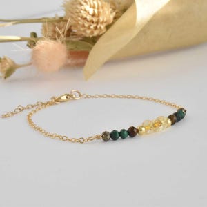 Dainty 14k Manifesting Bracelet to bring in wealth and money. Featuring malachite, pyrite, tiger's eye, and citrine. Handcrafted in the U.S.